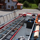 Dach mit Dachbox, Schiebeleiter 8m und 2 Steckleiterteile, Lichtmast dreh und schwenkbar 6x45W, Wasserwerfer