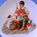 Beautiful plate gold trimmed Norman Rockwell inspired collectors plate
