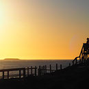 Sonnenuntergang bei den Whistling Rocks am Cape Baur