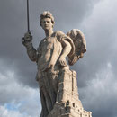 PUERTA DE BISAGRA. El ángel con la espada en la mano figura el guardián de la ciudad. 1562.