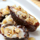 homemade stuffed dates with cream cheese, walnuts, and honey
