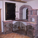 St. Martin  - Eggerwirt - Weingitter in Bronze & Weintresor in Eisen geschmiedet
