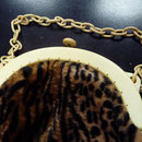 Vintage celluloid frame and chain. Fabric has been renewed - a leopardskin velvet. 25cm x 27 cm Price: € 128
