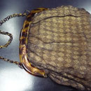 Vintage handbag. Lucite frame with lurex outer fabric, lining is synthetic. The outer fabric is tired, has some holes. 25 x 28 cm Price: €65