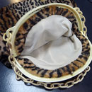Vintage celluloid frame and chain. Fabric has been renewed - a leopardskin velvet. 25cm x 27 cm Price: € 128