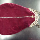Vintage silver-plated frame with professionally renewed fabric: bordeaux velvet. Exquisite angel motif on the frame. Long chain which can be carried double. 29cm x 21cm Price: €220