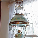 # 18 Elegante lampe à l'huile suspendue ornée de cristal.Utile et agréable dans votre décor.