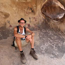 Having a break among indian petroglyphs.