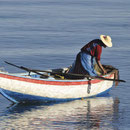 Fischerin am frühen Morgen