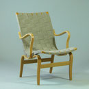 Fåtölj design Bruno Mathssson för Karl Mathsson 'Eva'. Skiktlimmad bok och sadelgjord. H.84cm.