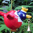 Eingangsvogel mit Messingglöckchen