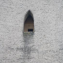 Einflugloch in den Turm der Oettersdorfer Kirche