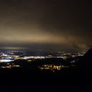 Das Mittelland leuchtet im Abenddunst gegen die Bättlerchuchi