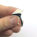 Ring mit Zahn