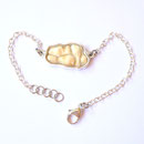 Armschmuck mit Pferdezahn