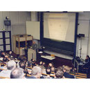 Blick von oben im  "großen Hörsaal" des PTZ: Am Mikrofon Brandenburgs Wirtschaftsminister Dreher beim Schienenfahrzeug-Kongress. Quelle Foto: Helga Karl