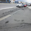 Erdbebenueberflutungen in einer Strasse in Christchurch