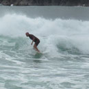 Surfer in Mount Manganui