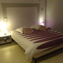 Ambiance cosy de la chambre Parme du blockhaus de domleger