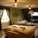 La chambre nature avec son lit rond dans votre maison d'hôtes