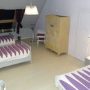 Les deux lits simples de la chambre Parme