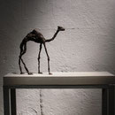 Thema Massenbewegung: Titel: Schwindende Ressourcen bleibende Visionen. 2010. Bronze, Stein (Auflage 15 Stück)