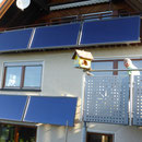 Walddorf: Solarkollektoren Balkon / Fassade
