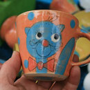 Kindertasse "Miezi" Mini in orange Artikel - Nr. 5017/ 14,- € (H 8  ∅ 9 cm)