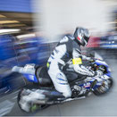 Motorradfahrer in der Boxengasse als Mitzieher bei der German Speedweek in der Motorsportarena in Oschersleben