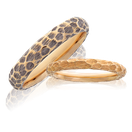 Feine Rotgold Eheringe mit Schmiedekunst aus der Trauring Kollektion Panthera von der Goldschmiede OBSESSION in Zürich und Wetzikon.