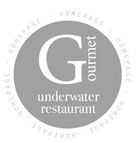 Logo vom underwater Restaurant in der Seelodge im Quellenhof Luxury Resort in St. Martin in Passeier