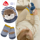 Rasselsocken Fehn Kollektion Otter & strampelndes Baby