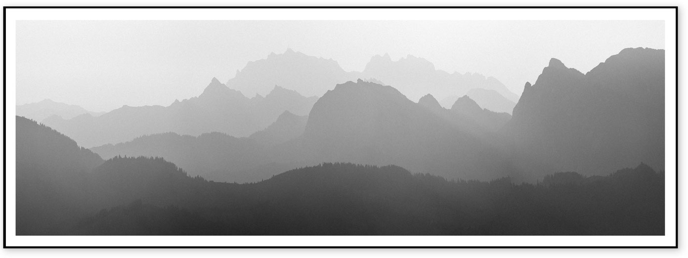 Minimal black and white panorama of mountain silhouettes in the Alpstein range with Säntis