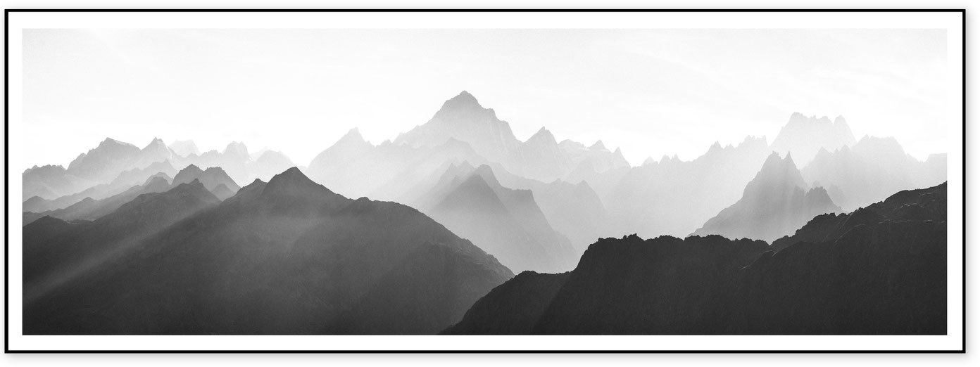 Minimal black and white panorama of mountain silhouettes in the Bernese Alps, Switzerland