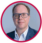 Prof. Dr. med. Markus Hambek, weißes hemd, blauer sako, brille und kurze haare