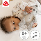 Baby mit Spieluhr Faultier