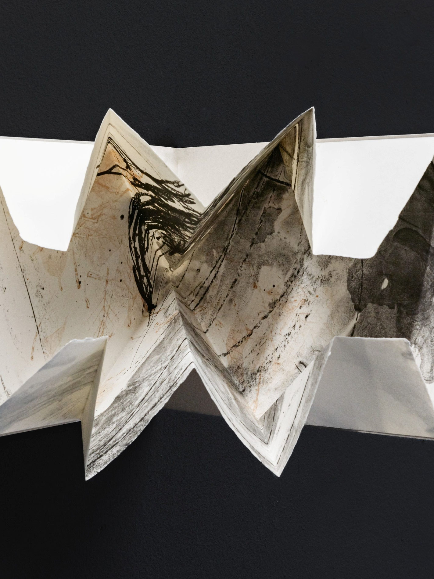 BUCHENWALD | 2026 | 40 x 50 cm| plate lithography, embossing with beech leaves, poem & concept by Heike Berl, folding & binding by Nadine Werner, handmade paper by John Gerard, edition of 3, photo © www.materialmatters.online / Victoria Gentsch