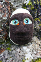 Tête, dim. h 20 cm x 14 cm x 15 cm.