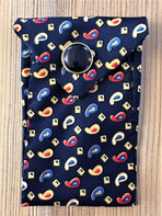handgenähtes Krawatten-Tascherl - dunkelblau mit kleinen Ornamenten in gelb, rot, blau