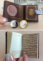 A white line divides the portrait format into upper and lower halves. At the top, a hand holds the open mini-book ensemble on Bach, two coins below are a size comparison. At the bottom, several fingers can be seen holding open the smallest Bach book.