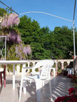 South facing terrace with the wisteria in full bloom in April
