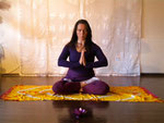 Namaste in Anjali Mudra im Lotussitz