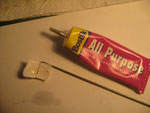 Use All Purpose Bostick to glue cloth hinges to the puppet.