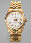 Herrenarmbanduhr der Marke ROLEX "Oyster Perpetual Date", 18K GG, CHF 9'600, June 2014