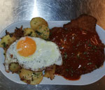 Zigeunerschnitzel mit Bratkartoffeln und Spiegelei