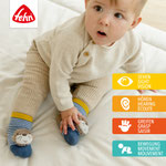 Baby liegen auf Decke mit Fehn Rasselsocken Otter