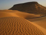 TEMBAINE MOUNTAIN AND DESERT LANDSCAPE IN THE GRAND ERG ORIENTAL