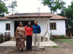 Bajram and Farija with their mother in front of their house (2008)