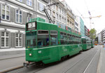 Der Trammotorwagen Be 4/4 Nr.497 auf der Linie 3, die Haltestelle Bankverein anfahrend, Juli 2105
