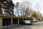 Blick gegen die Burgfelderstrasse mit den Autogaragen der Wohngenossenschaft Kannenfeld an der Ensisheimerstrasse, 2015